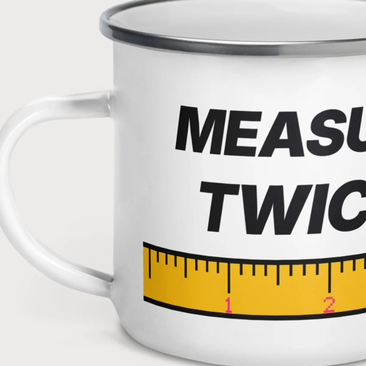 Close up of the Measure Twice Camp Mug design