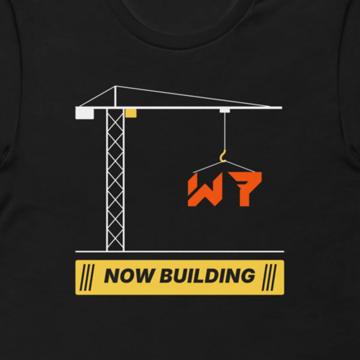 Close up of the Now Building Tee design