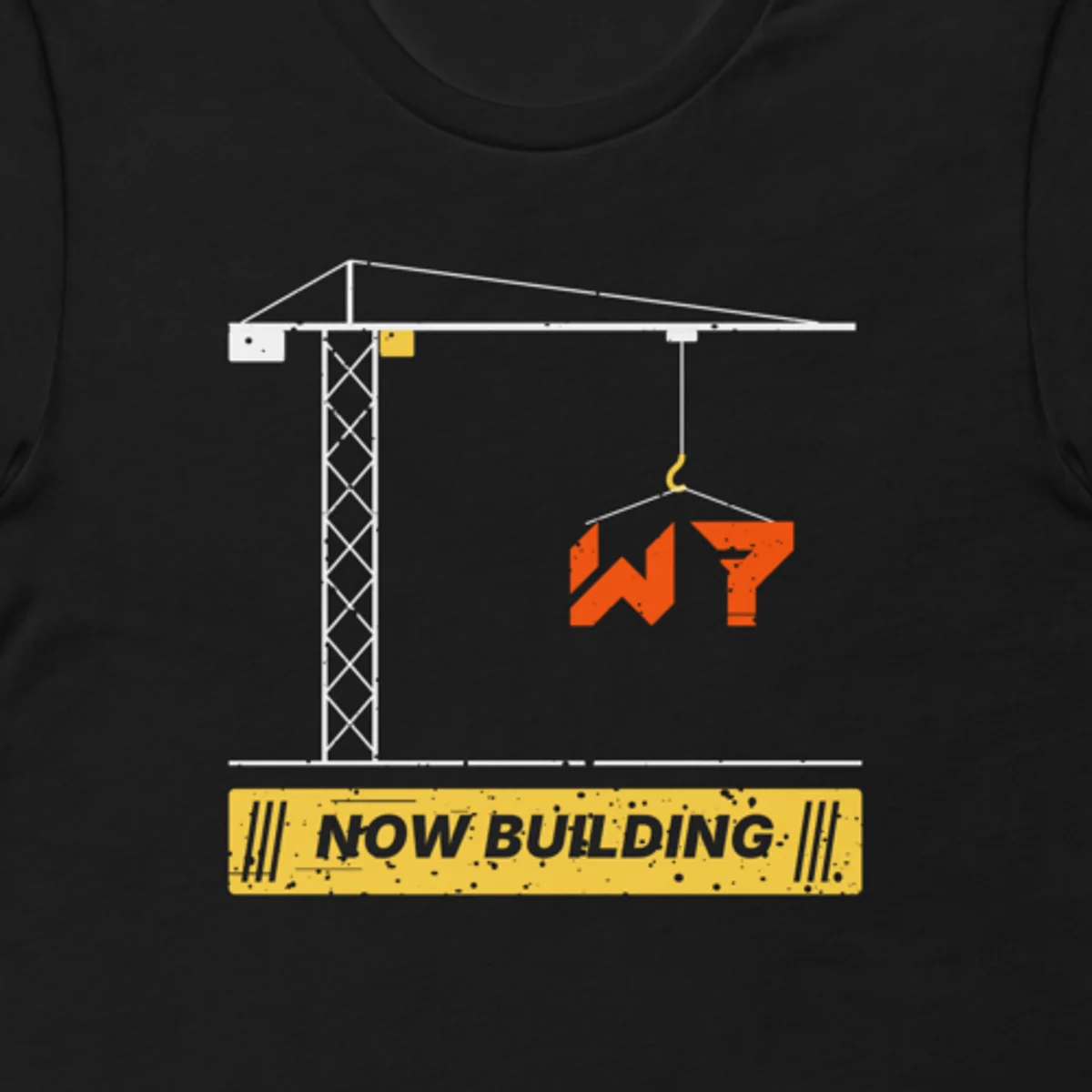 Close up of the Now Building Tee, Worn In design