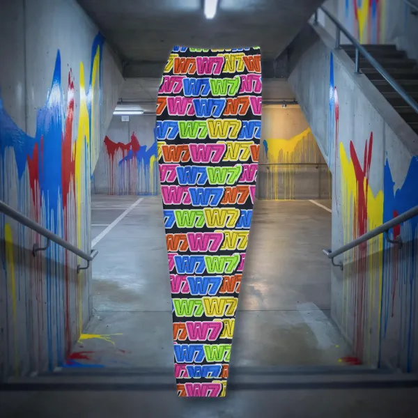 Throw Up Joggers all over print in a styled photo