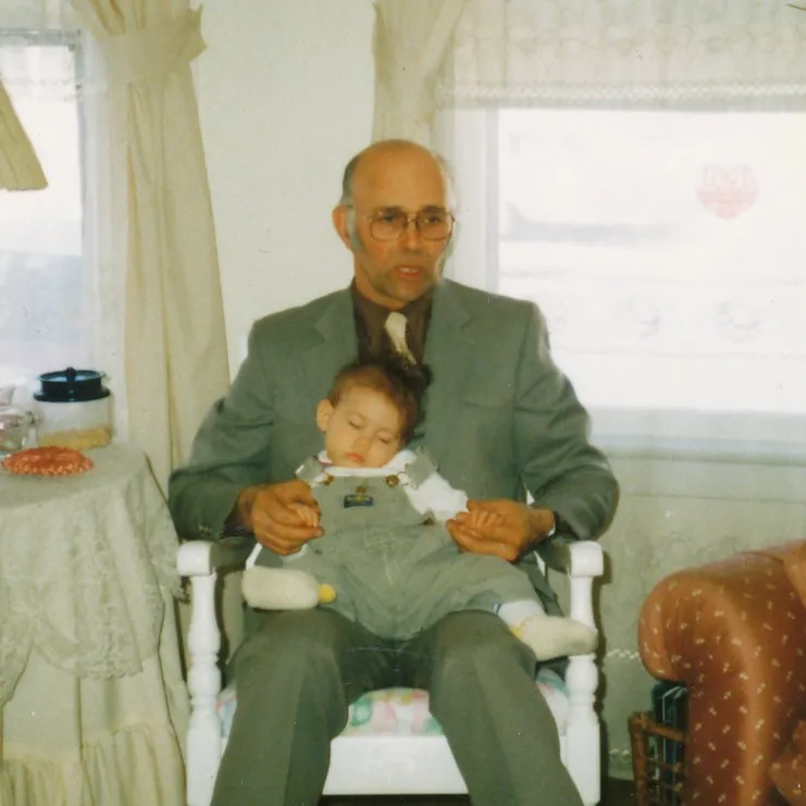 Jesse as a baby with Grandpa Waldo