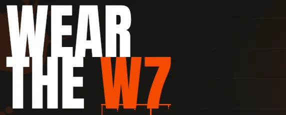 The W7 Merch headline, "WEAR THE W7", set in anton
